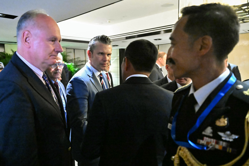 Defense Secretary Pete Hegseth (c.) arrives for a ministerial roundtable during the 23rd Shangri-La Dialogue summit in Singapore on May 30, 2026.