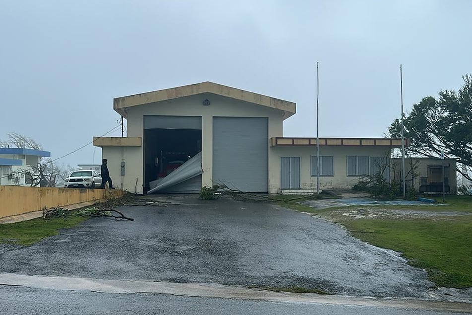 The Department of Fire and Emergency Management Services’ fire station in Songsong on the island Rota in the Northern Mariana Islands is damaged after Super Typhoon Bavi made landfall on July 6, 2026.