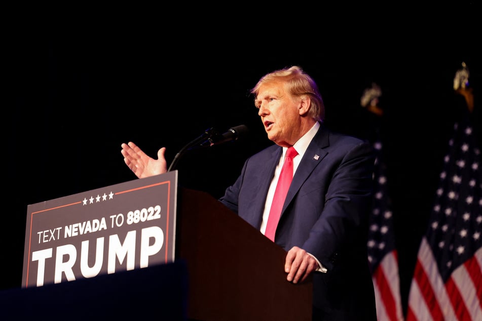 Former president and 2024 Republican hopeful Donald Trump speaks at a Nevada caucus night party at Treasure Island Resort & Casino in Las Vegas, Nevada.