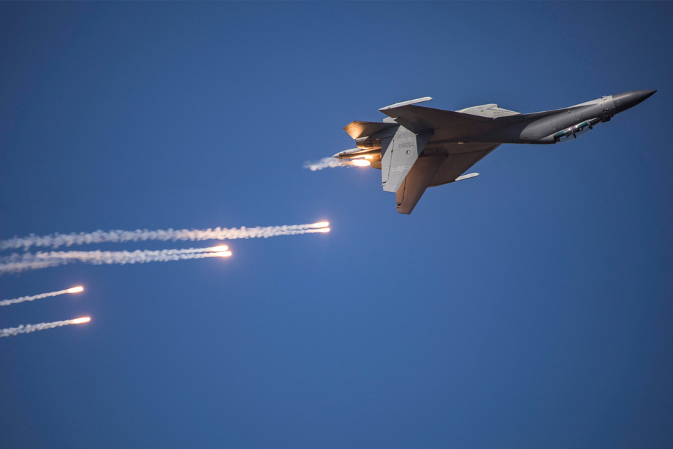 Dozens of Chinese warplanes circle Taiwan as tensions escalate
