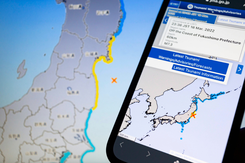 Japan's meteorological agency displayed info about the 7.3 magnitude earthquake that hit the coast of Fukushima Prefecture on Wednesday, triggering a tsunami warning.