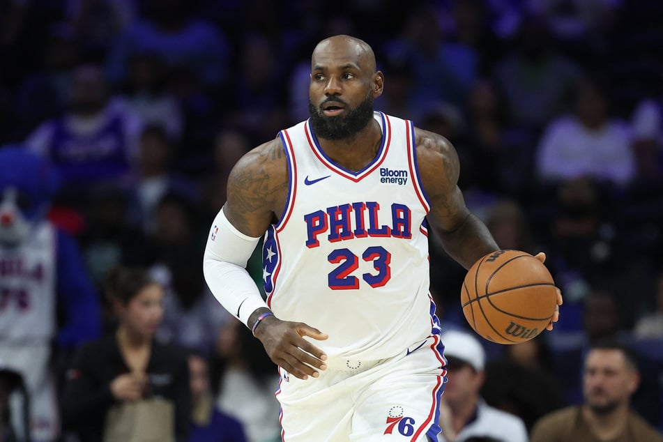 Philadelphia 76ers forward LeBron James controls the ball against the Boston Celtics during the first quarter at Xfinity Mobile Arena on October 16, 2026. The basketball legend is chasing one more NBA title in his 24th season.