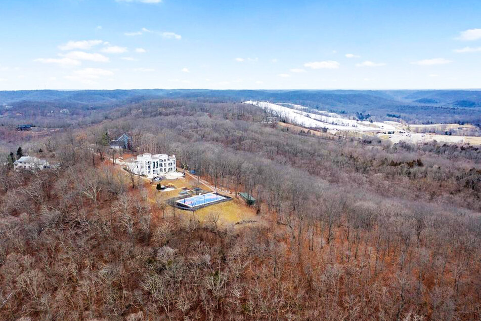The mansion sits on a 12 acre lot of property.