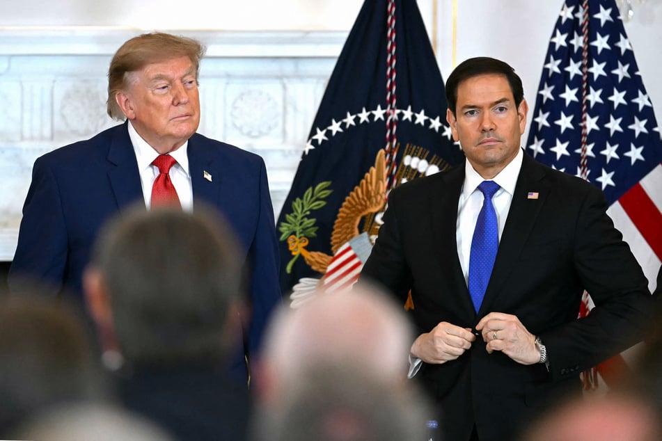 President Donald Trump (l.) and Secretary of State Marco Rubio (r.) stand together at the US Department of State in Washington DC on August 7, 2026.