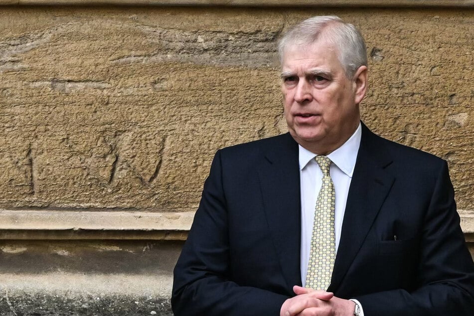The former Prince Andrew reacts as he arrives at St. George's Chapel, Windsor Castle, to attend the Easter Mattins Service, on March 31, 2024. The disgraced ex-royal has received $400,000 in compensation after giving up his mansion at the Windsor estate.