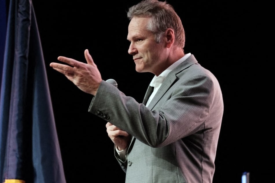 Alaska's Republican Governor Mike Dunleavy speaks at a 2022 event. The governor said he's directing the Department of Public Safety to see if the Democratic Senate candidate's alleged actions warrant civil action or criminal charges.