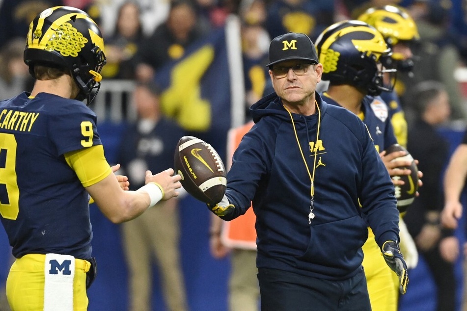 Big Ten suspends coach Jim Harbaugh for entire regular-season over Michigan scandal