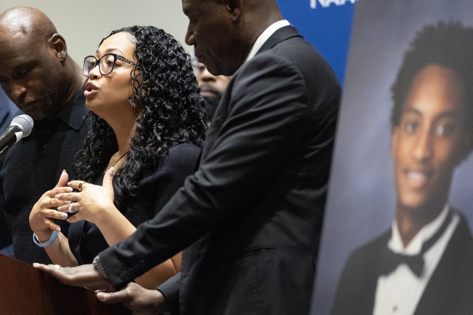 Christine Wells-Wonsley, the mother of Nolan Wells, speaks during a press conference with attorney Ben Crump (r.) to announce preliminary results of an independent autopsy on July 22, 2026. The full report is expected to be released by attorney Ben Crump's team.