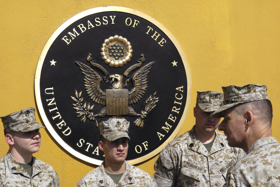 Pentagon sends thousands of troops to US embassy in Afghanistan as negotiators ask Taliban not to attack