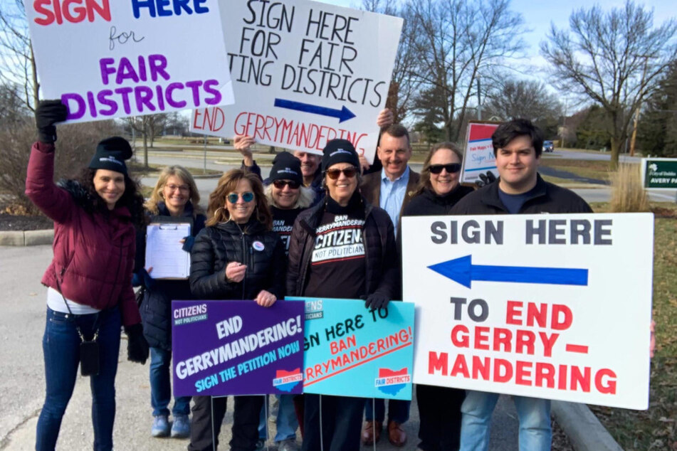 Volunteers gather signatures for the Citizens Not Politicians Amendment to end gerrymandering in Ohio.
