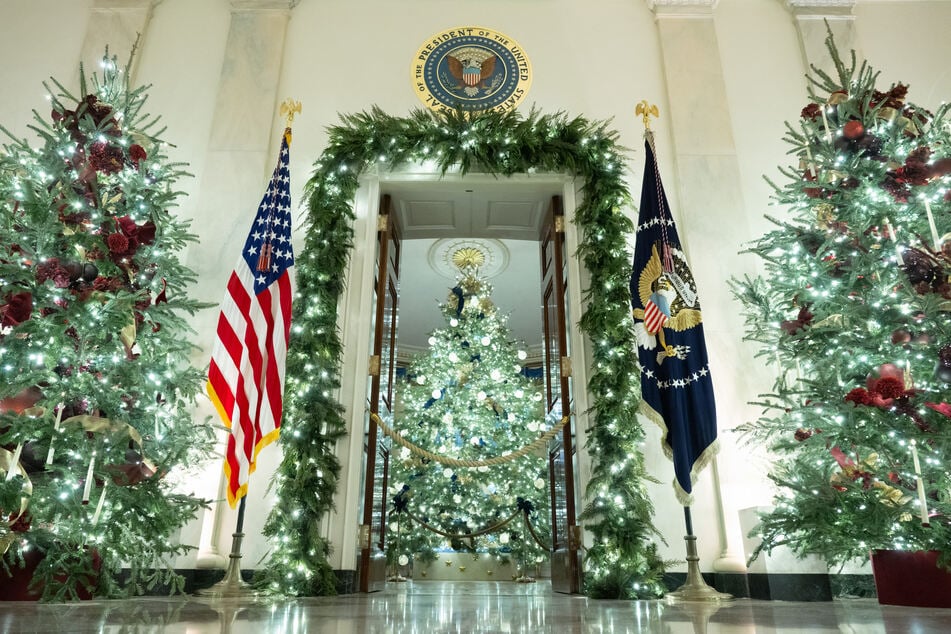 Christmas decorations are seen in the Grand Foyer of the White House on December 1, 2025.