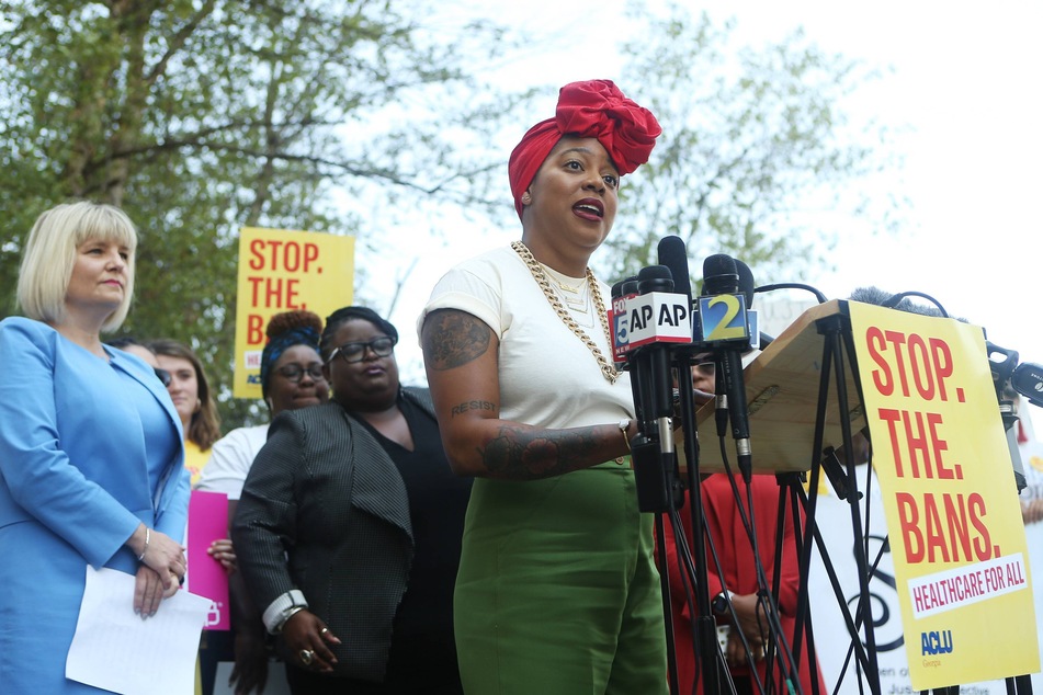 Kwajelyn Jackson, executive director of Feminist Women's Health Center, speaks out against Georgia's fetal heartbeat bill on the steps of the Richard B. Russell Federal Building in Atlanta.