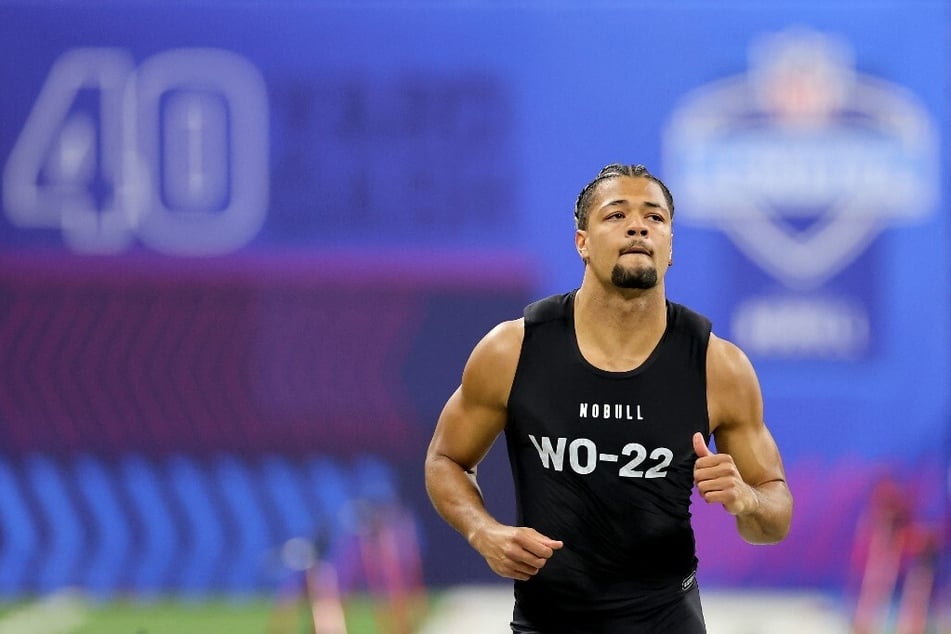 Rome Odunze impressed at the NFL Combine, potentially boosting his draft position thanks to several player opt-outs and no shows.