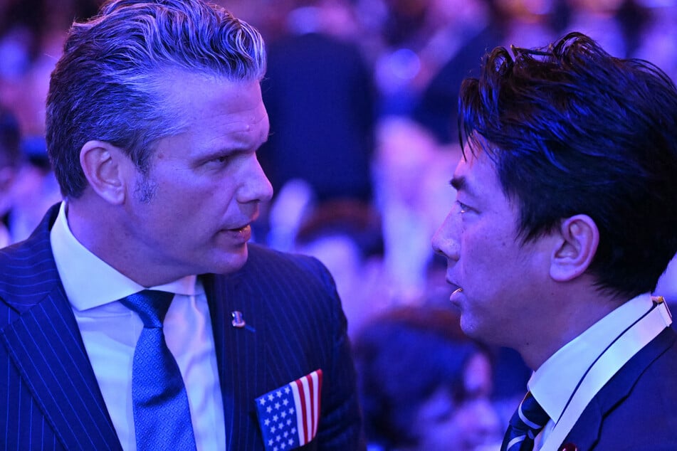 Pete Hegseth was seen chatting with Japanese Defense Minister Shinjiro Koizumi (r.) at the summit on Friday.