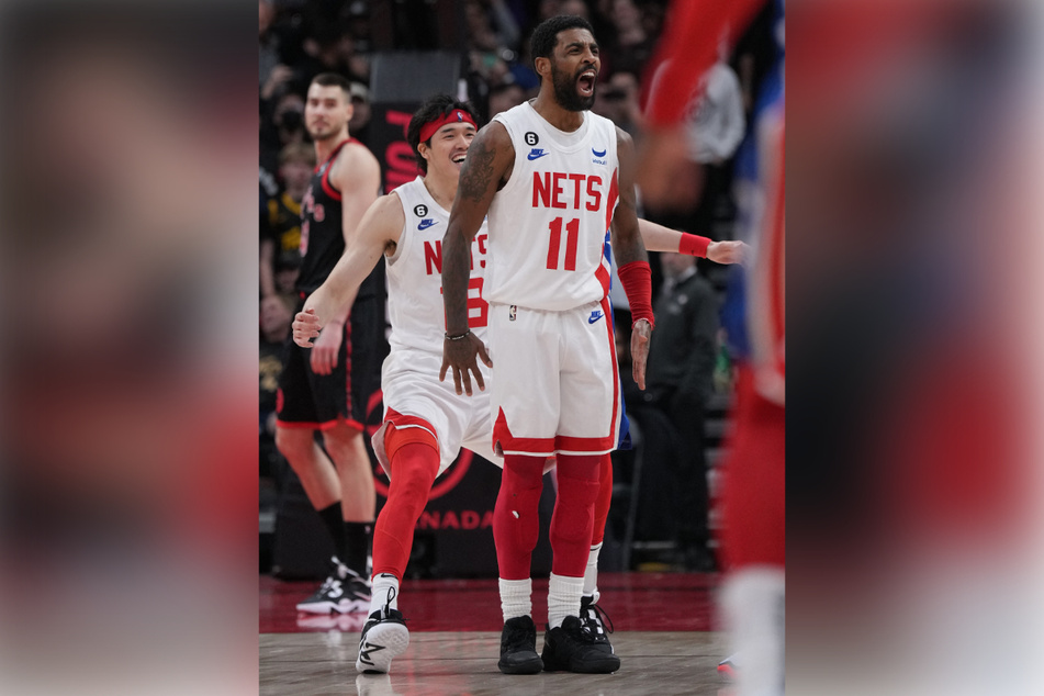 Brooklyn Nets' Kyrie Irving celebrated his game winning buzzer beater basket against the Toronto Raptors at the Scotiabank Arena on Friday.
