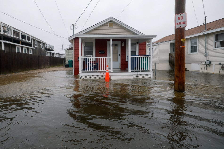 Tidal flooding reaches homes in Hampton, New Hampshire, as a strong Nor'easter storm batters the East Coast, on September 27, 2026.