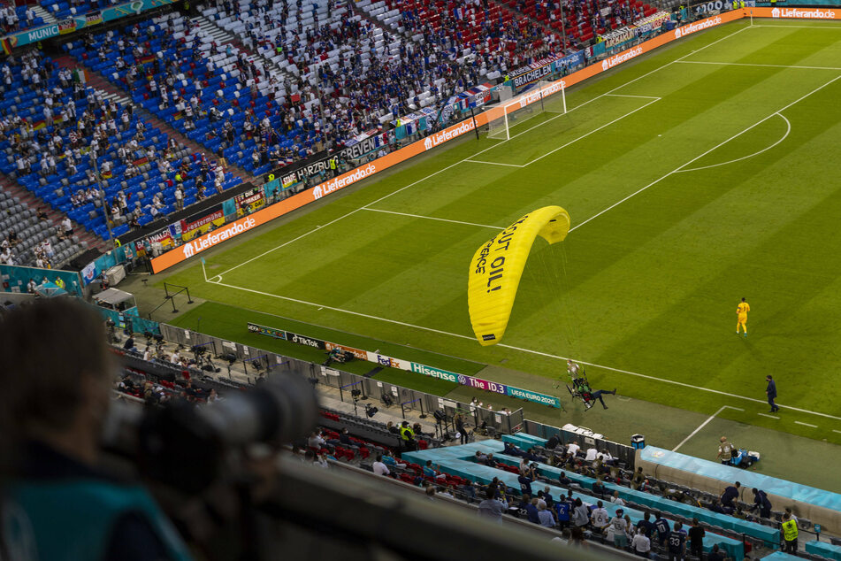 Parachuting Greenpeace protester causes panic and injuries at Euro 2020 soccer championships