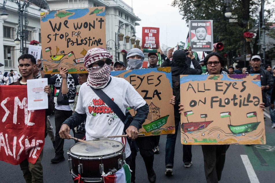 Activists hold a rally against Israel’s interception of ships participating in the Global Sumud Flotilla in Bandung, Indonesia, on May 19, 2026.