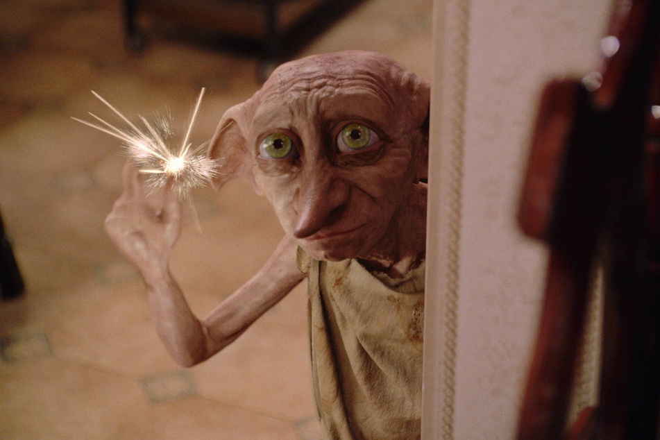 Harry Potter fans have been asked by local officials to quit leaving socks at the grave site of the fictional character Dobby at Freshwater Beach in Wales.