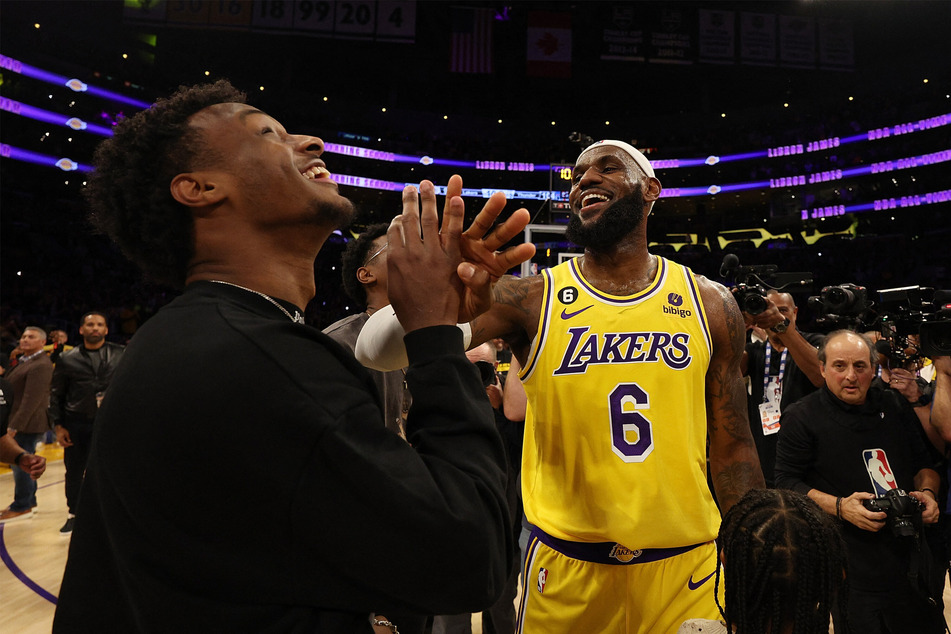 LeBron James with his son Bronny James (l.) after becoming the NBA's all-time leading scorer in February.