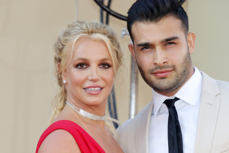 Sam Asghari (r.) said his marriage to Britney Spears was "very real" after the pop star admitted he felt like a "distraction" for her.
