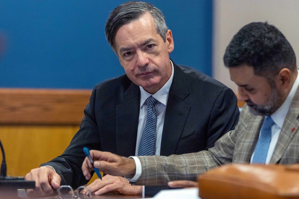 Kenneth Chesebro (l.) with his attorney Manny Arora on Friday where Chesebro accepted a plea deal at the Fulton County Courthouse, facing seven charges related to his alleged role in trying to skew the 2020 elections in Trump's favor.