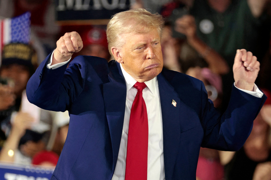 Donald Trump promised that he is just getting started as he marked the radical beginning of a presidency that has shaken the world and destabilized the US.