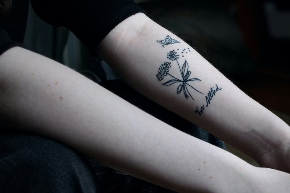 Man abandoned as a baby breaks down over birth mother's touching tattoo tribute