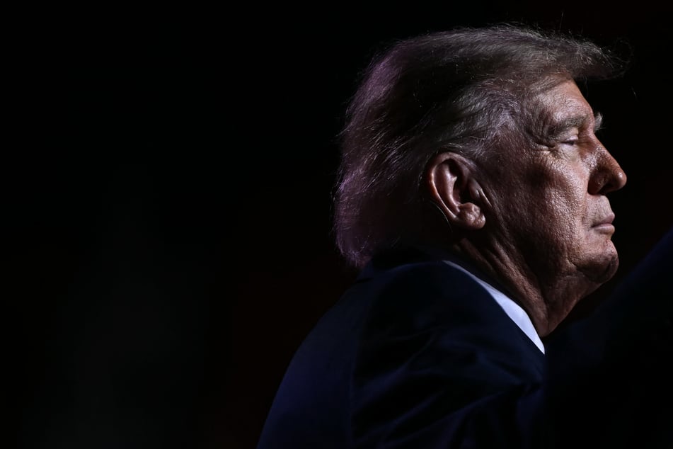 President Donald Trump speaks during a midterm campaign rally at The Mitchell Center of the University of South Alabama on Friday. A judge has now halted the president's controversial Big Bend border project.