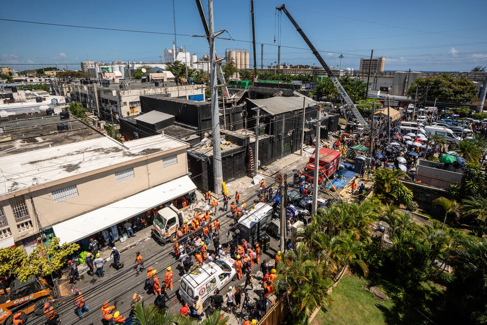 The president's office had earlier put the final death toll at 221, with 189 people pulled alive from the nightclub, now reduced to mounds of twisted steel, zinc, and brick.