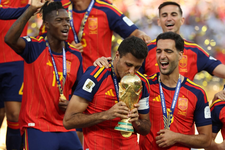 Spanish midfielder Rodri celebrates with the team after winning the 2026 FIFA World Cup.