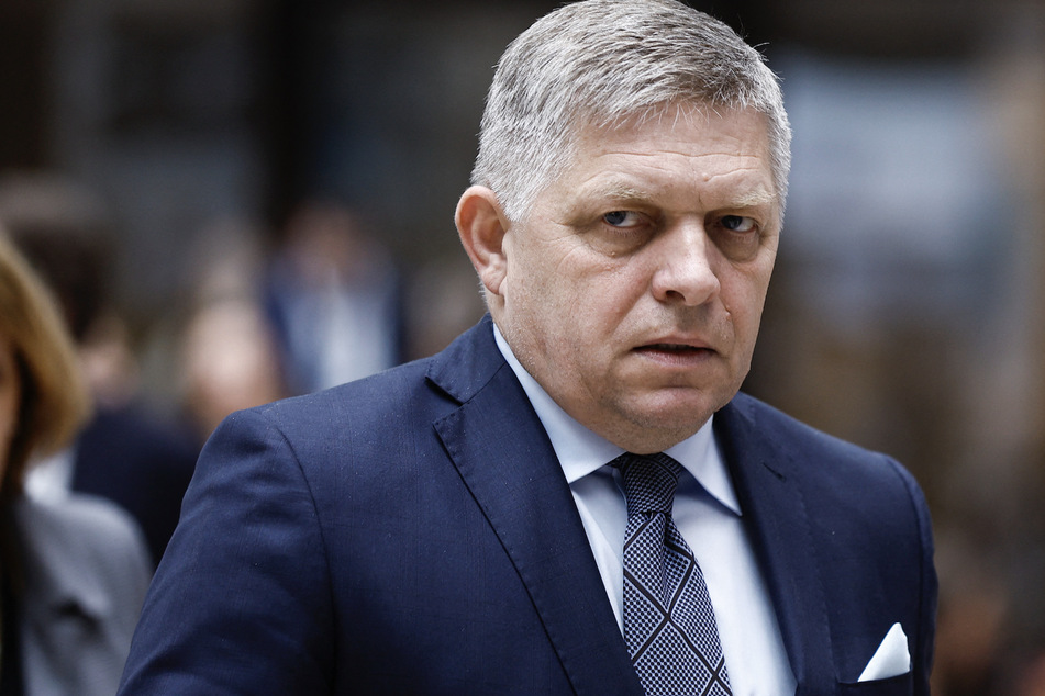 Slovakia's Prime Minister Robert Fico walks during the European Council summit at the EU headquarters in Brussels, on April 18, 2024.