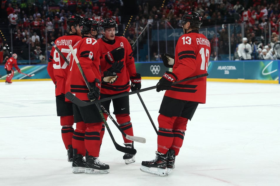 Cale Makar, Sidney Crosby, Connor McDavid, and Sam Reinhart of Canada are pictured during their Group A preliminary round against France at the Milano Santagiulia Ice Hockey Arena on February 15, 2026.