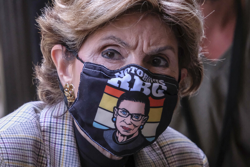 Attorney Gloria Allred, who represents several of Harvey Weinstein's accusers, wore a RBG face mask on Wednesday as she spoke outside the court following Harvey Weinstein's not guilty plea in Los Angeles.