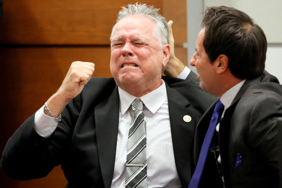 Scot Peterson, a former sheriff's deputy accused of failing to protect students during the 2018 mass shooting at Parkland's Marjory Stoneman Douglas High School, reacts after he was found not guilty on all charges at the Broward County Courthouse in Fort Lauderdale, Florida.