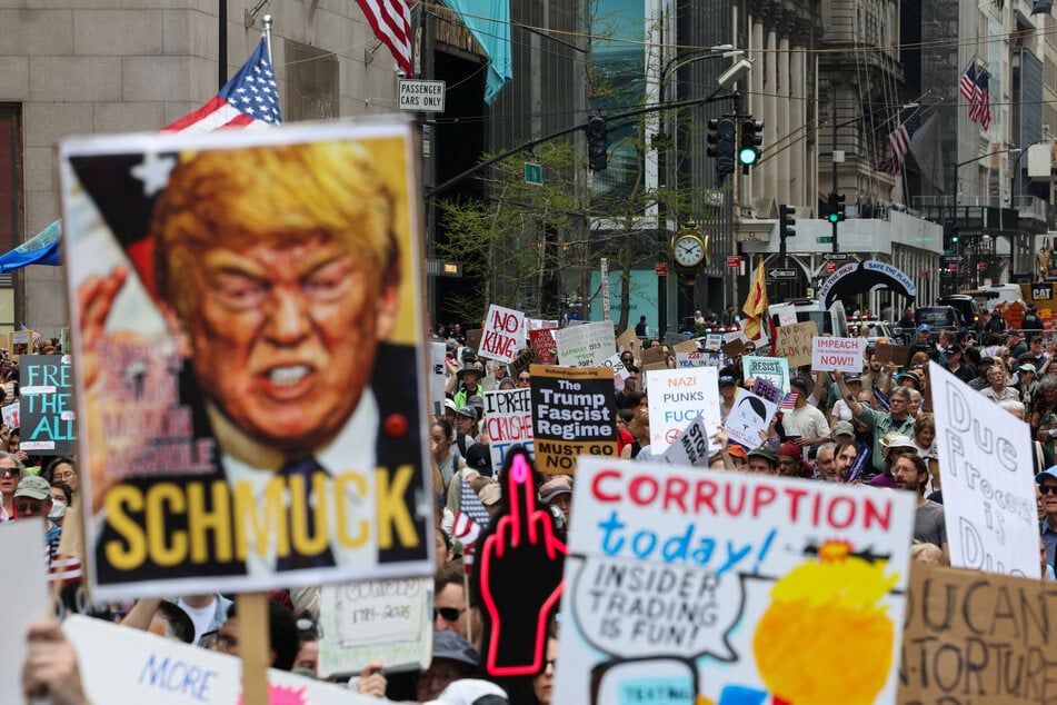 Thousands of people turned out to protest in New York and other US cities against President Donald Trump and his administration.