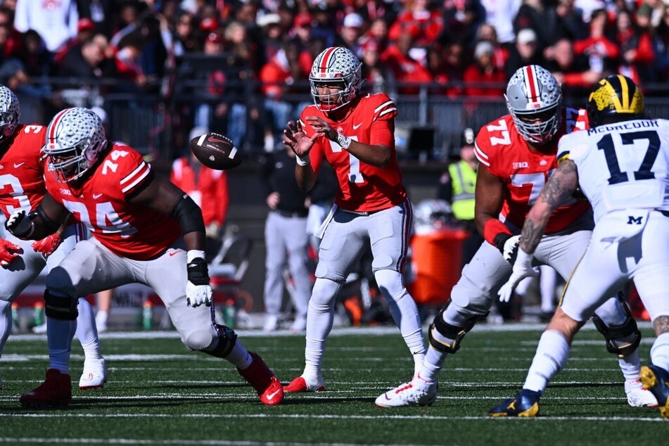 Ohio State quarterback CJ Stroud (c) will look to use his Heisman-caliber passing attacks against the Georgia Bulldogs in the College Football Playoff semifinal Peach Bowl showdown.