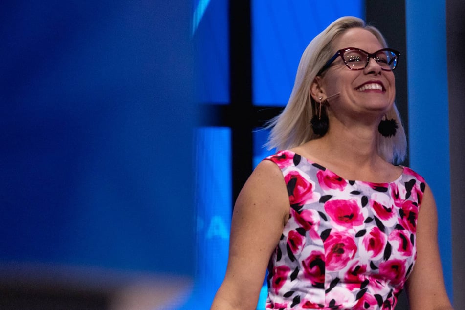 Kyrsten Sinema jets off to Europe as reconciliation negotiations continue