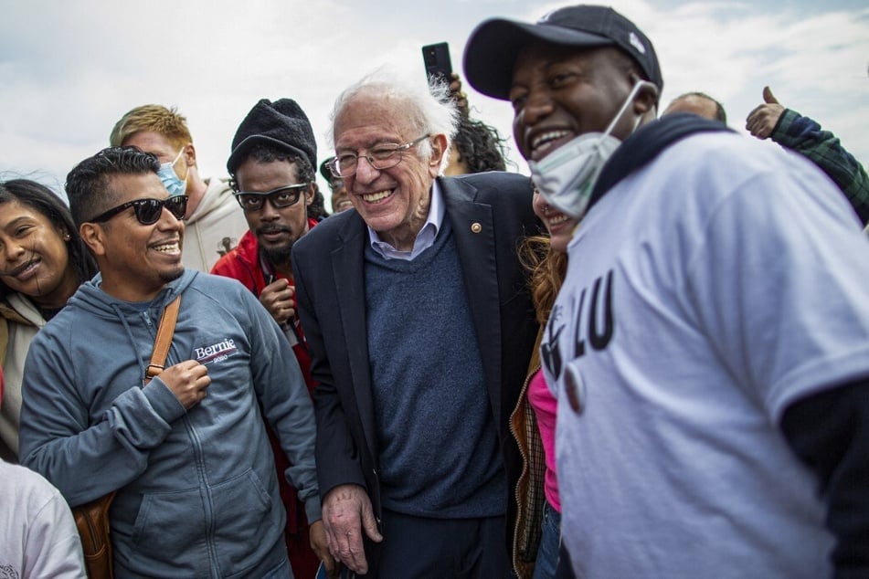 Sen. Bernie Sanders poses with Amazon workers after speaking in support of the Amazon Labor Union at a rally on Staten Island, New York.