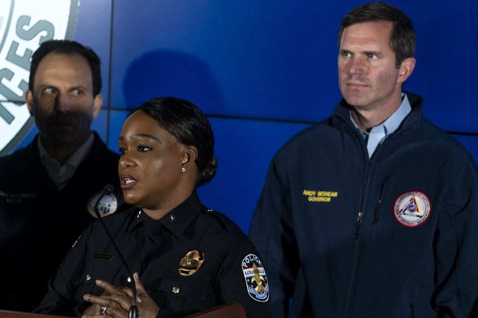 Jacquelyn Gwinn-Villaroel (c.) updates the press about the mass shooting at Old National Bank in Louisville, Kentucky.