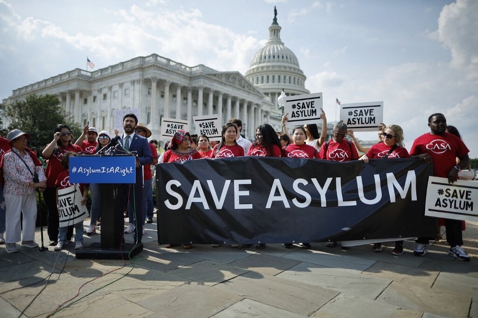 Democratic members of the House of Representatives and immigrants' rights advocates voice their opposition to President Joe Biden's new anti-migrant executive order outside the US Capitol.