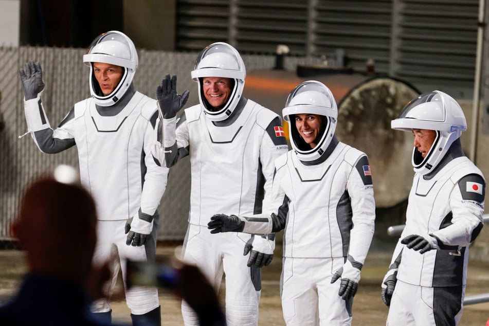 NASA astronaut Jasmin Moghbeli, European Space Agency astronaut Andreas Mogensen, JAXA (Japan Aerospace Exploration Agency) astronaut Satoshi Furukawa, and Roscosmos cosmonaut Konstantin Borisov depart their crew quarters for the launch pad before their mission to the International Space Station.