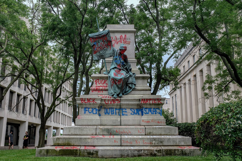 The pedestal upon which stood the statue of Confederate general Albert Pike is pictured empty after it was toppled by protesters at Judiciary Square in Washington DC.