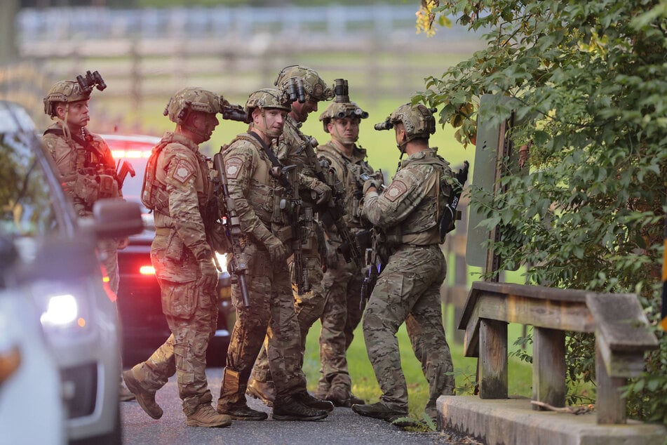 Hundreds of police officers with helicopters, drones, and search dogs are still out in full force looking for Cavalcante.