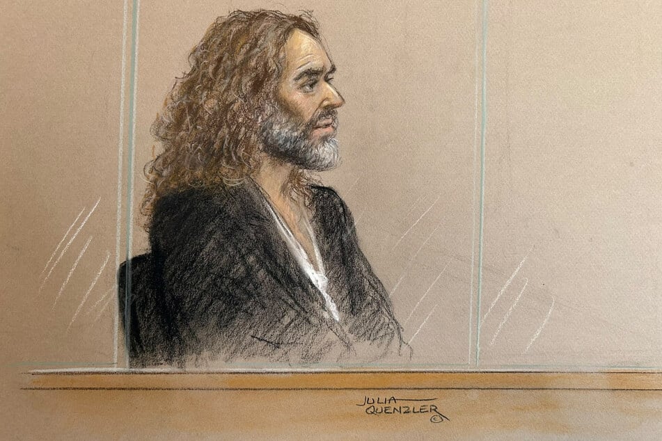 Russell Brand appears at Southwark Crown Court in London on Wednesday in this courtroom sketch. The comedian has denied the charges against him.