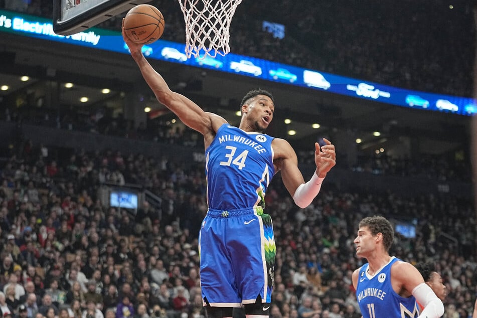 Giannis Antetokounmpo recorded his second triple-double of the season in the Milwaukee Bucks' overtime win against the Toronto Raptors.