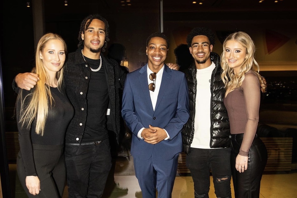 Ohio State legend CJ Stroud (center l) and Alabama Heisman winner Bryce Young (center r) teamed up alongside celebrities to speak about prison reform.