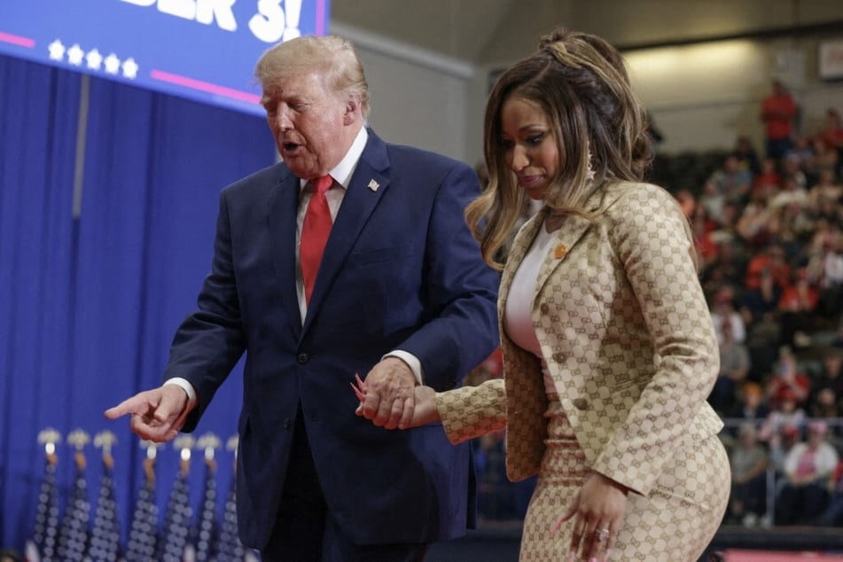 President Donald Trump (l.) and Nicki Minaj appear at a rally in Michigan on October 25, 2026. Trump said he is thinking about the idea of having Minaj be the new White House Press Secretary.