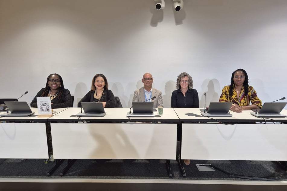 From l. to r.: Panelists Nana Gyamfi, Desirée Cormier Smith, Carlos Quesada, and Lisa Borden and moderator Dr. Amara Enyia pose for a photo on the sidelines of the fifth session of the UN Permanent Forum on People of African Descent.