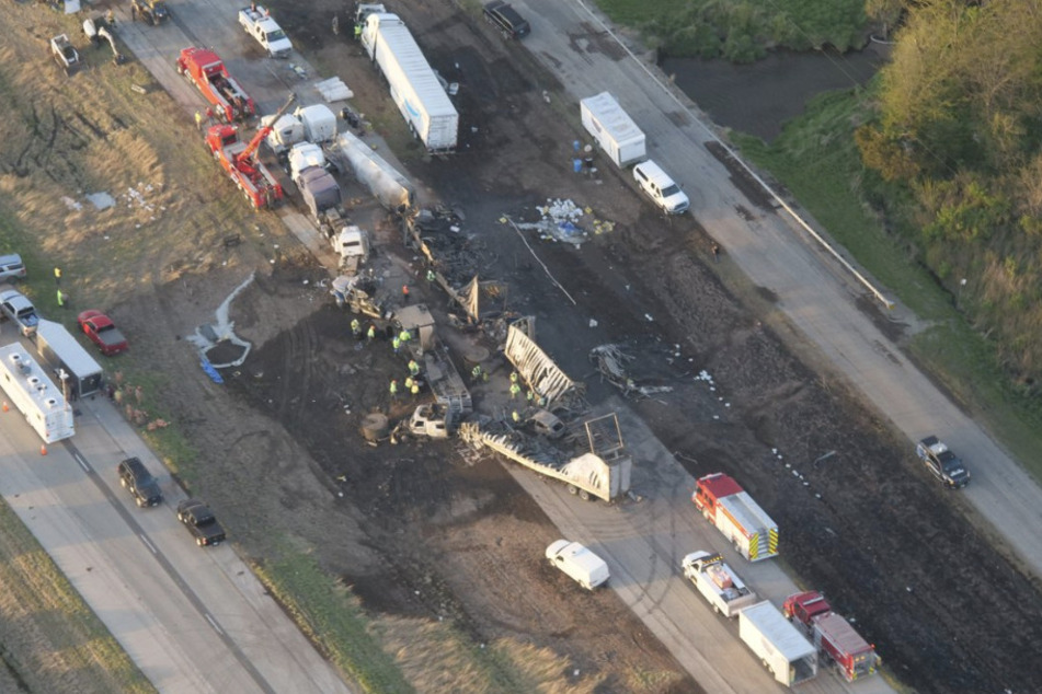 At least six people were killed and more than 30 injured after a dust storm caused pileups and a shutdown of Interstate 55 in Illinois Monday morning.